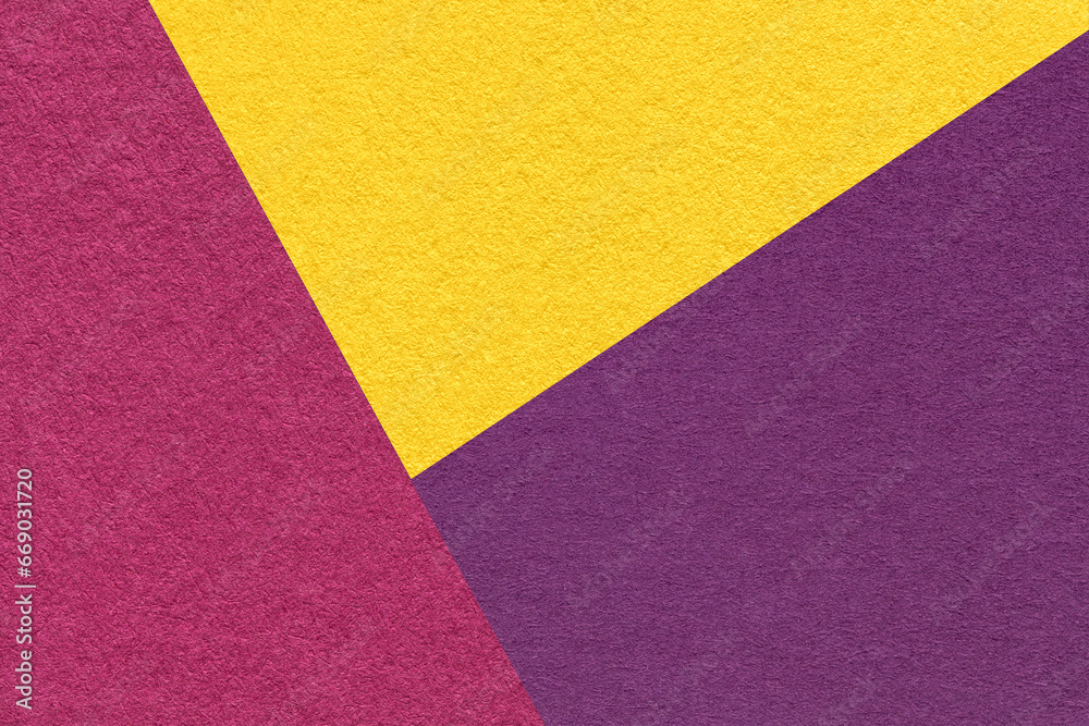 Texture of craft yellow, purple and violet shade color paper background, macro. Vintage abstract wine cardboard Texture of craft yellow, purple and violet shade color paper background, macro. Vintage abstract wine cardboard