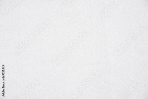 Primer white color paint on cement wall, built or renovated building.Home renovation and building new house, Construction concept.White pattern background. photo