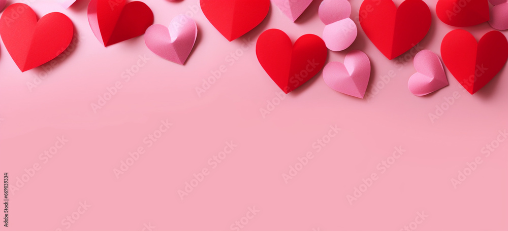 Valentine day composition with red hearts on pink background