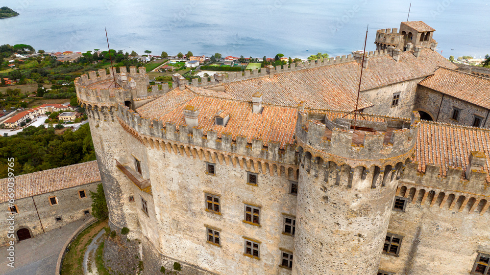 Aerial view of the Orsini-Odescalchi castle. It is a medieval castle in the town of Bracciano, in the metropolitan city of Rome, Italy. It overlooks Lake Bracciano.