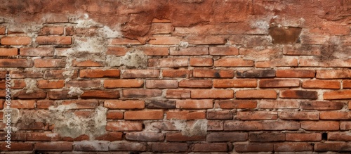 Close up of the texture of an aged brick wall