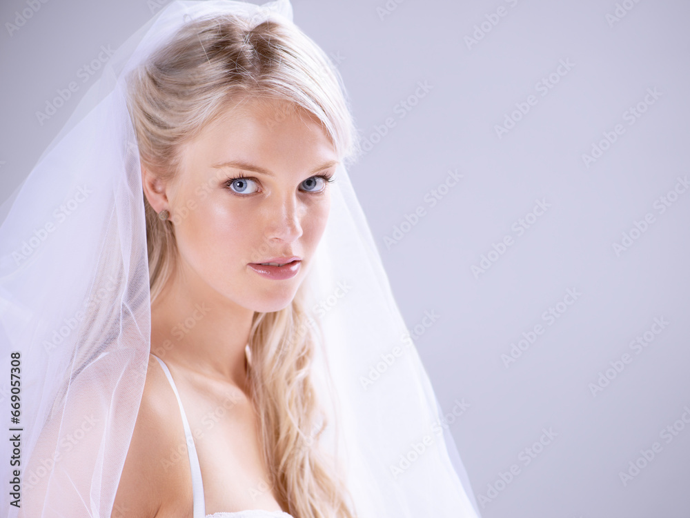 Portrait, bride and woman with beauty, makeup and celebration on a white studio background. Face, person and model with mockup space, wedding and marriage with girl, veil and commitment with style