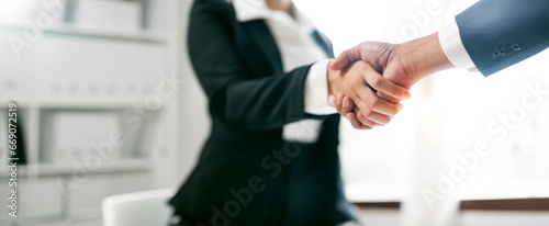 business people handshake for teamwork of business merger and acquisition
