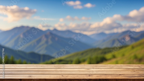 The empty wooden table top with blur background of mountain