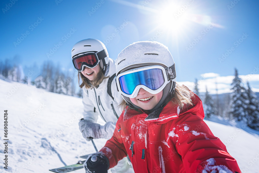 Portrait of a young couple skiers on the slope in the mountains. Selective focus Portrait of a young couple skiers on the slope in the mountains. Selective focus