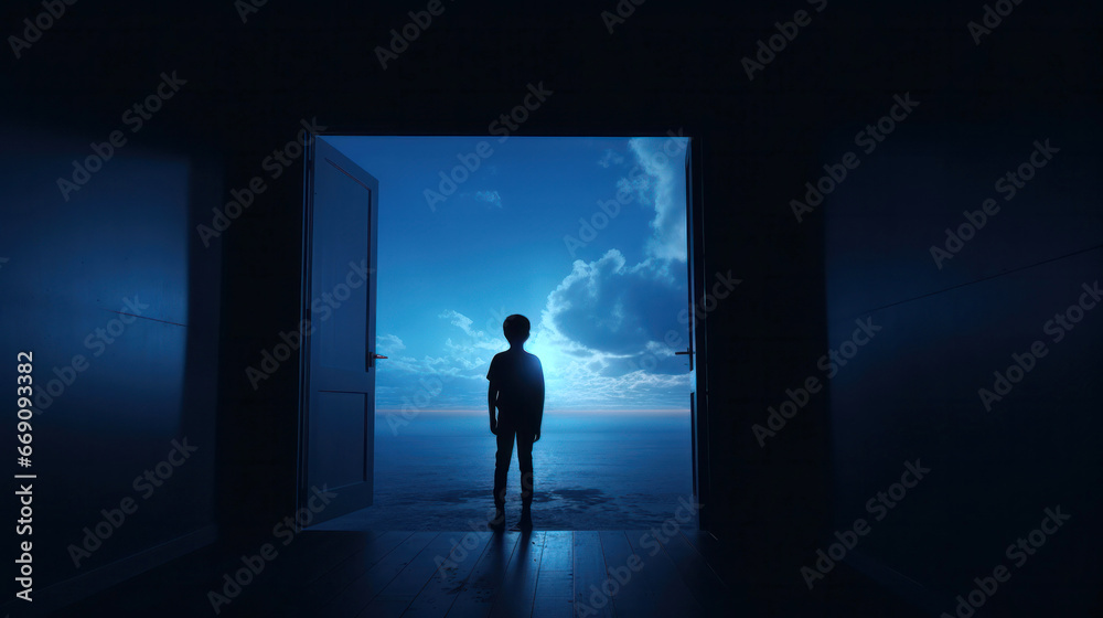 Young boy silhouette in dark room in front of the door from which the light emanates. The concept of social distance