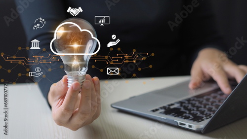woman use Laptop with cloud computing diagram show on hand. Cloud technology. Data storage. Networking and internet service concept.