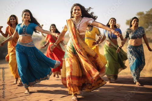 Indian women in national costumes dance on the street