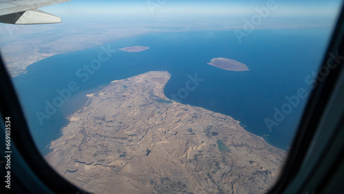 view of mountains and deserts from a passenger plane. Iran  Iraq  Persian Gulf