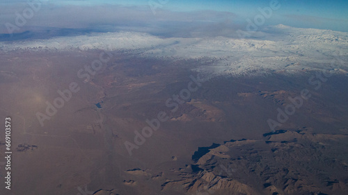 view of mountains and deserts from a passenger plane. Iran  Iraq  Persian Gulf