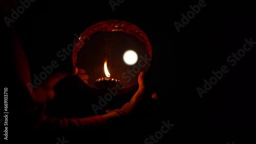 Karwa Chauth strainer and Diya oil lamps for the Karwa Chauth celebration on the night photo