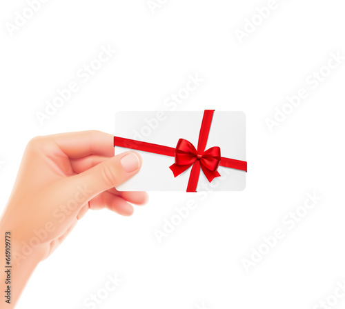 Gift card with red bow and ribbon in hand. Hight realistic vector illustration, ready and simple to use for your design. It can be used for greetings, congratulations and etc. EPS10.