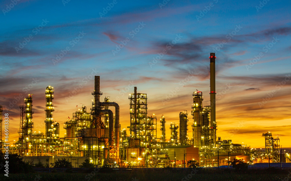 Twilight scene of tank oil refinery plant and tower column of Petrochemistry