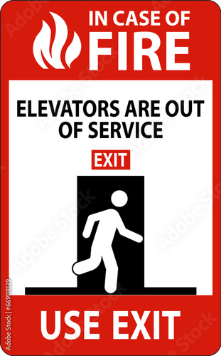 In Case Of Fire Sign Elevators Are Out of Service, Use Exit
