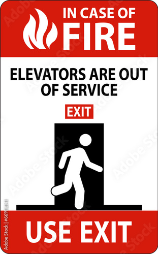 In Case Of Fire Sign Elevators Are Out of Service, Use Exit