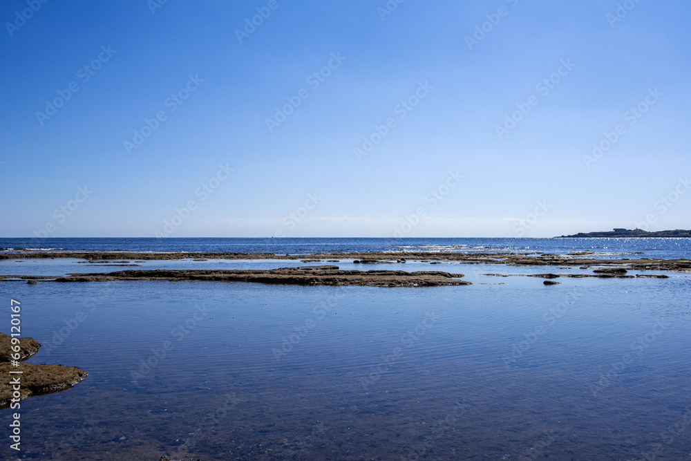 The beautiful landscape of rocky seascape and blue ocean,