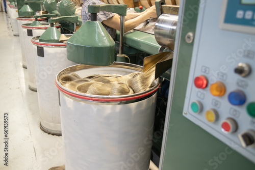 Industrial loom on textile .Flax processing plant, fabric production. Flax is made .A workshop at a textile factory.