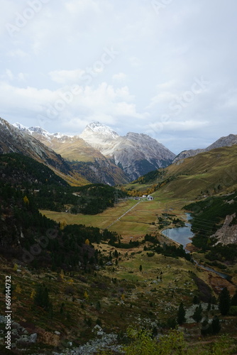 landscape with lake and mountains, vertical orientation, graubunden, grisons, switzerland