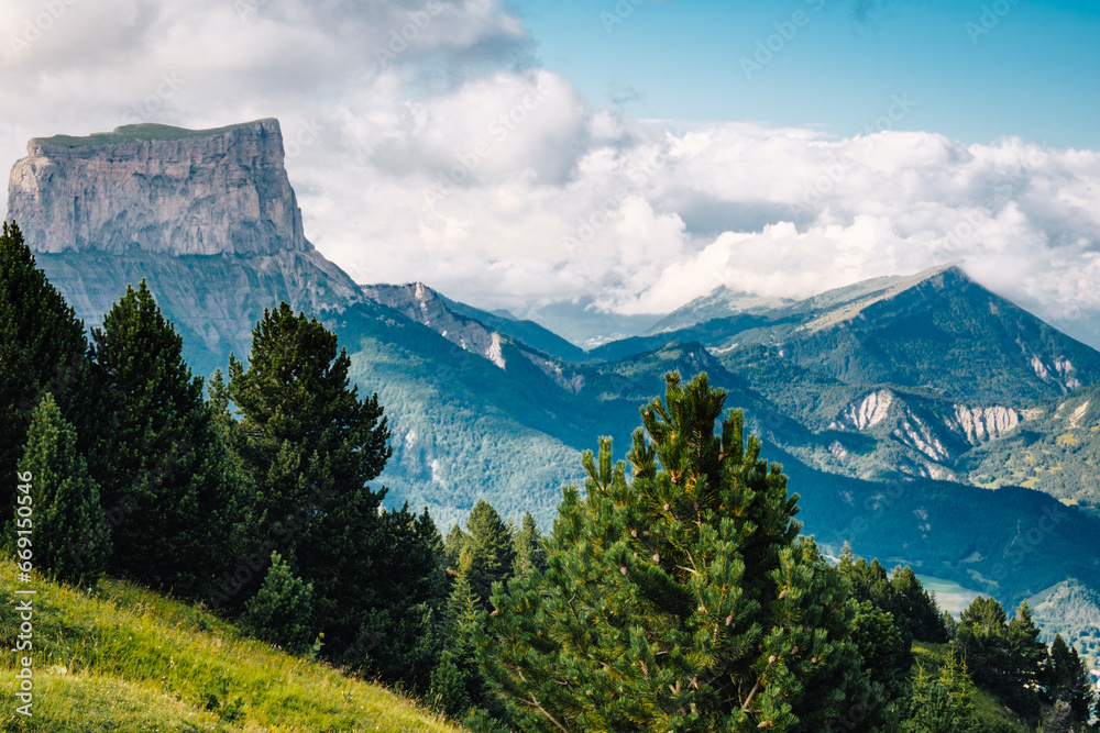 View of Mont Aiguille in the Vercors from the Alpine Meadows and Cliffs of the Vallon De Combeau Nature Reserve near Chatillon en Diois in the South of France