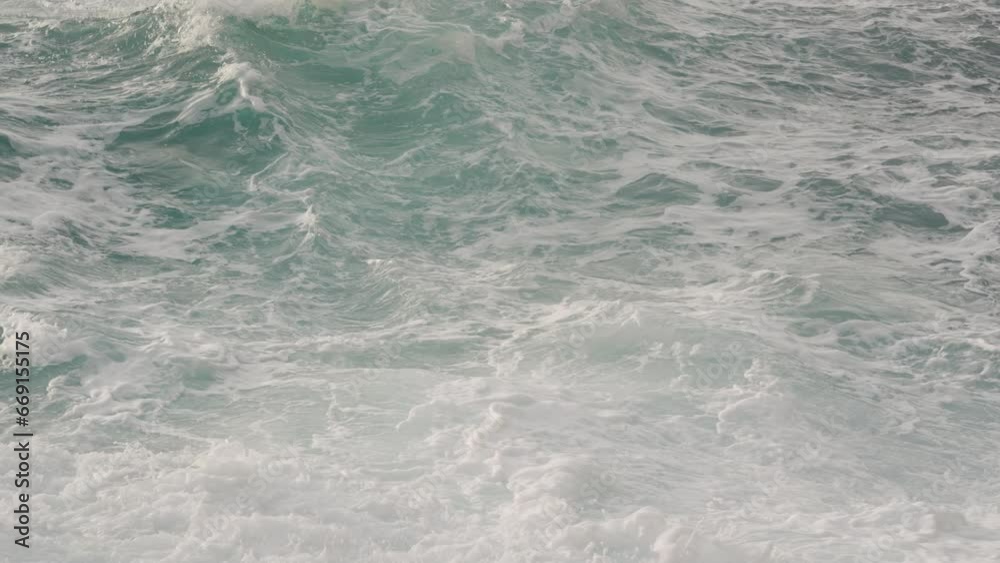 Slow motion blue water sea surface with soft summer light closeup Slow motion blue water sea surface with soft summer light closeup