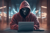 hacker in mask and hoodie using laptop hacker in mask and hoodie using laptop hacker using laptop computer at night