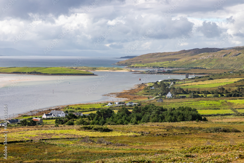 Houses, Vegetation, mountains and ocean in Achill Island