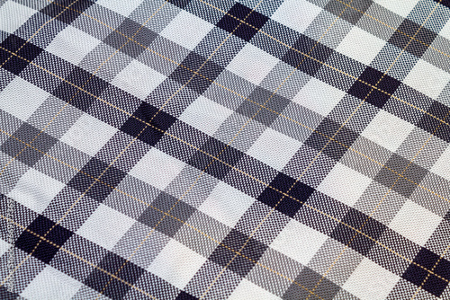 Old cotton fabric in black and white check