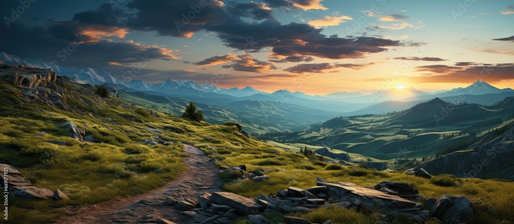 Mountain landscape with hiking trail and evening sky view.
