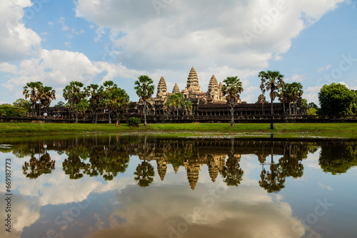 General view of the famous temple of Angkor Wat  Cambodia  Asia  photographed in the afternoon  and reflected in the water of the outer lagoons surrounding it.