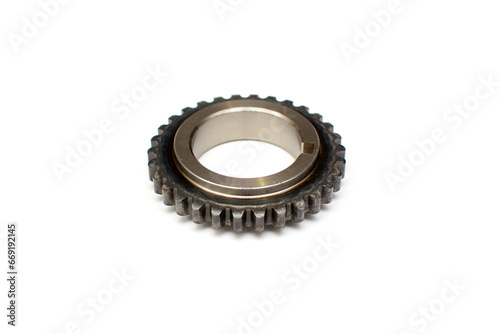 Car chain tensioner sprocket on isolated white background. New spare part. photo