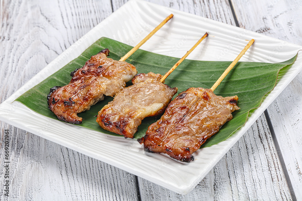 Thai cuisine - grilled pork skewer Thai cuisine - grilled pork skewer