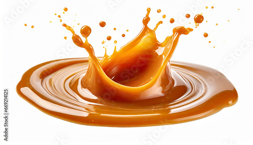 caramel sauce splash isolated on white background with clipping path photo