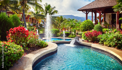 tropical garden with fountain near villa © Art_me2541