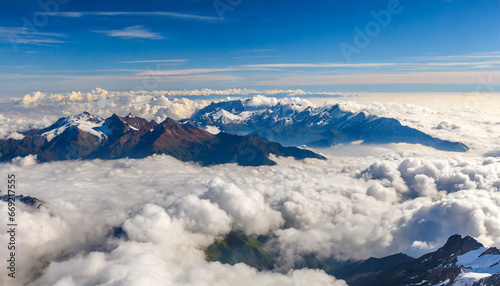 a view of a mountain range from above the clouds in the sky generative ai