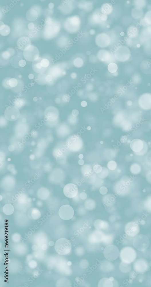 Artistic concept winter circle bokeh vertical motion background. Seamless looping. Artistic concept winter circle bokeh vertical motion background. Seamless looping.