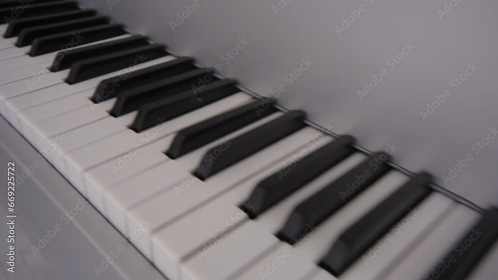 The camera moves over the piano keys The camera moves over the piano keys