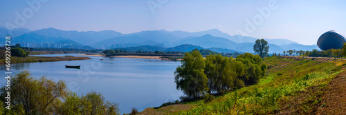 Daegu City nature landscape in autumn, tranquil riverbank, forest, and mountain views over the wildlife conservation area in Nakdong River, South Korea