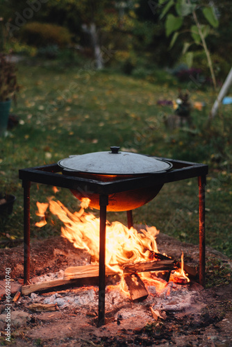 wok, cauldron, cooking, outdoor cooking, world cuisine, fire, fire pit, nature, pilaf, dishes, nature, season, evening, wood, background