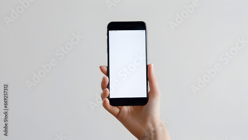 Holding smartphone with visible screen.segurando Smartphone  com tela visivel. photo