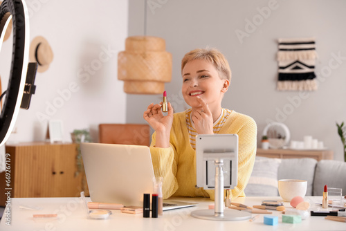 Female beauty blogger with ...