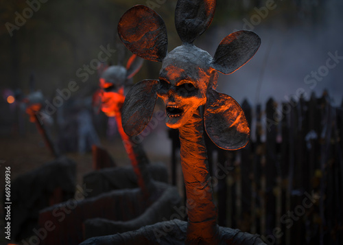 Halloween decoration, strange demon monster with many petals on the head