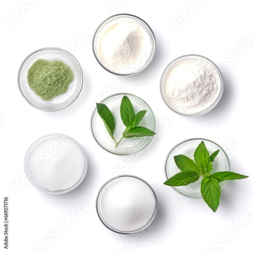 Set of different stevia sweeteners in powder, with leaves  with matcha isolated separately on white background, top view photo