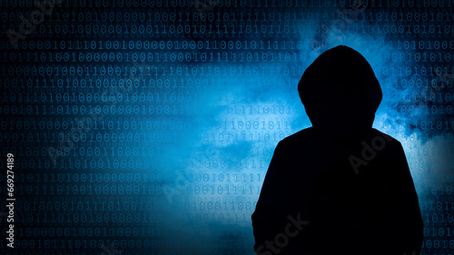 Silhouette of a cybercriminal against a backdrop of swirling blue smoke and numbers, cybercriminal concept photo