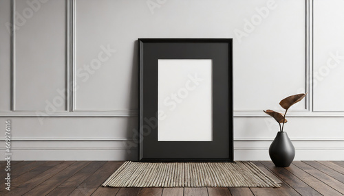 Empty black frame with mat on wooden floor with white wall, 45 ratio - 40x50 cm, 16 x 20 inches, poster frame mock up, 3d rendering photo