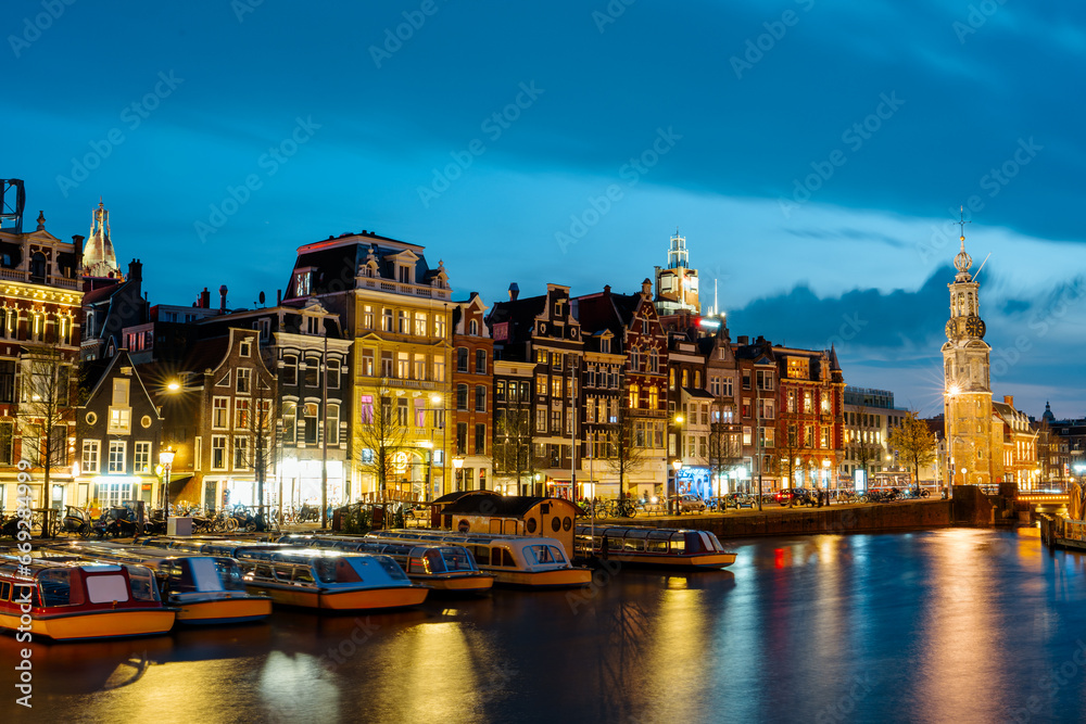 Captivating Night in Amsterdam: A Mesmerizing Long Exposure Photo of Amsterdam's Nighttime Canals.
