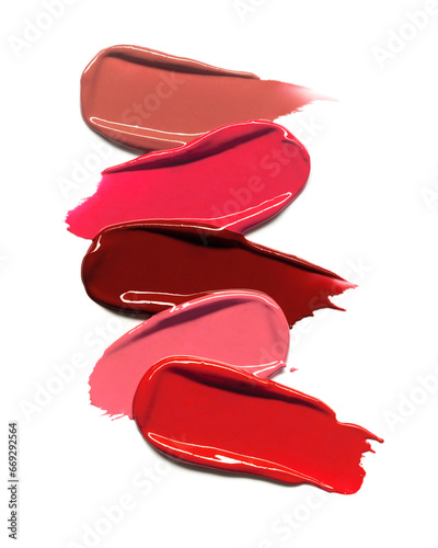 Range of lipstick texture composition isolated on white background. Cosmetic product smear smudge swatch photo