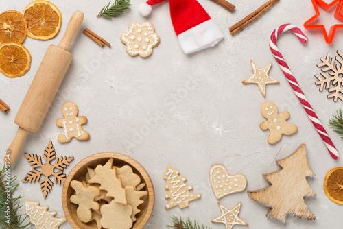 Flat lay with cute homemade Christmas cookies on concrete background,top view