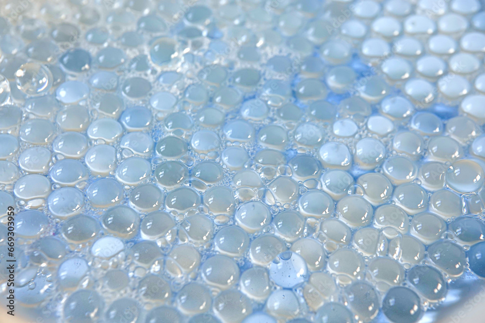 even rows of blue balls spinning