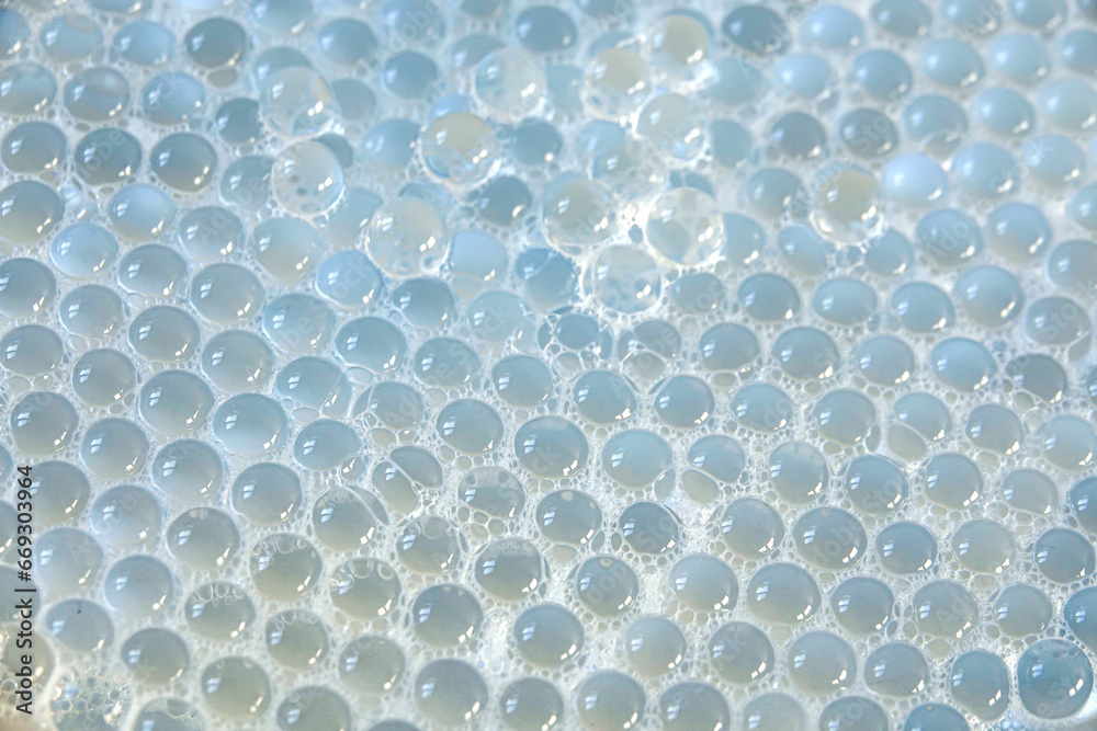 hygiene and cleaning product with balls in soapy liquid