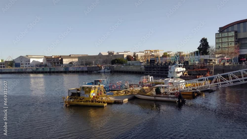 The Riachuelo River and Boats Moored in La Boca Neighbourhood, Buenos Aires, Argentina. The Riachuelo River and Boats Moored in La Boca Neighbourhood, Buenos Aires, Argentina.